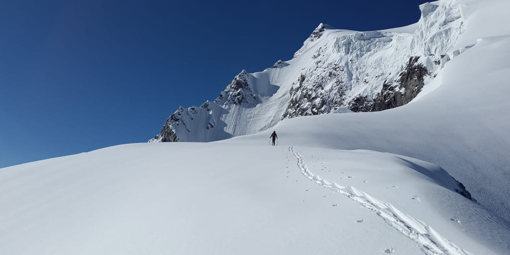man-climbing-up-in-snow-100 man climbing up in snow